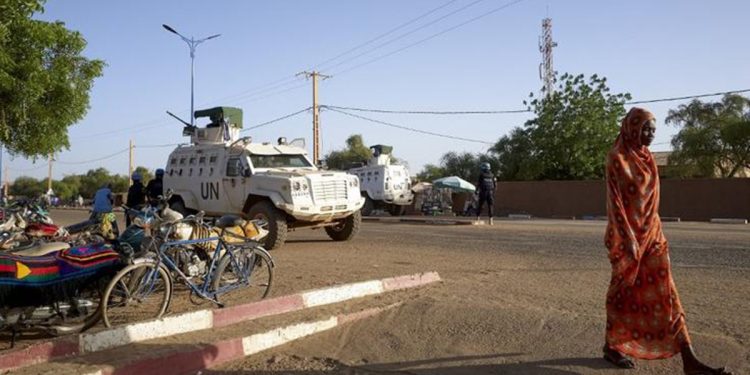 A picture shows a woman walking in front of the hospital in Gao, Mali on Oct 14, 2020. (MICHELE CATTANI / UNOCHA)