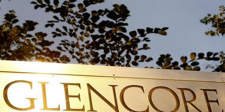 The logo of commodities trader Glencore is pictured in front of the company's headquarters in Baar, Switzerland, July 18, 2017. REUTERS/Arnd Wiegmann/File Photo