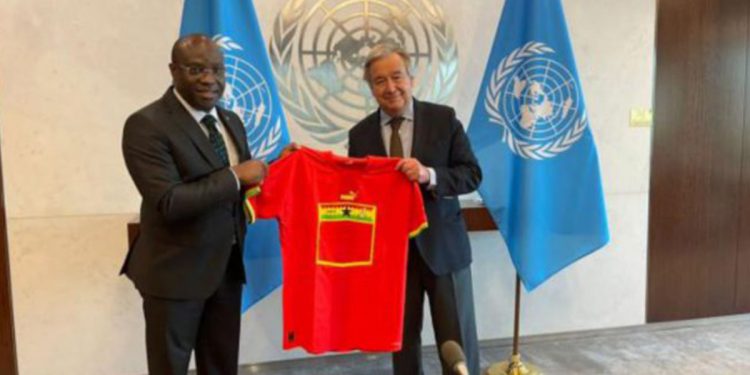 Ghana’s Permanent Representative at the UN, Harold Agyeman presenting the jersey to Guterres